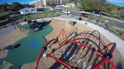 Hovering low over an empty playground in a local neighborhood (2 of 2) Stock Footage 42312169