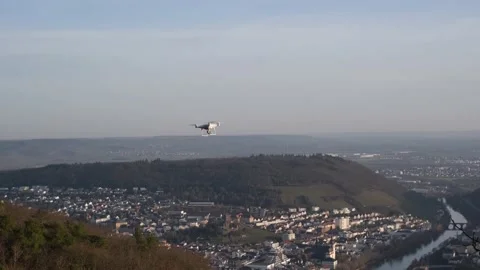Hovering multicopter taking pictures of winter nature Stock Footage 149372104