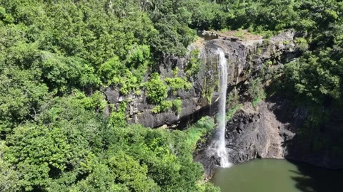 Hovering next to the highest of the Seven Cascades waterfalls aka Tamarind Falls Stock Footage 275145553