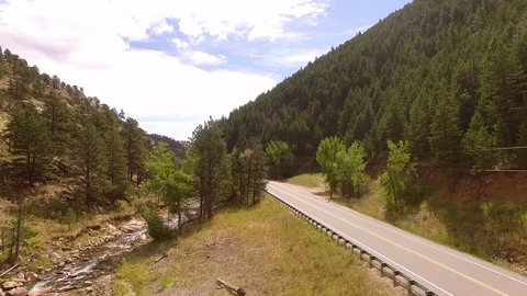 Hovering Over Mountain Road Color Corrected Stock Footage 100209634