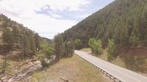 Hovering Over Mountain Road Stock Footage 100209654