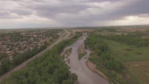 Hovering Over River and Road Facing South Stock Footage 98846804