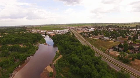 Hovering Over River &amp; Road Color Corrected Stock Footage 98846765