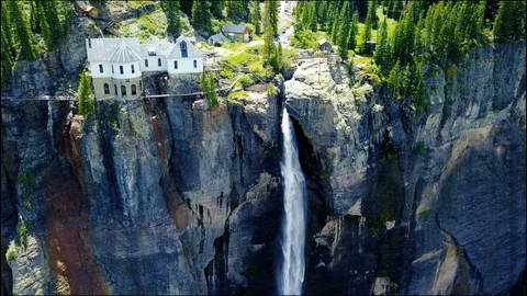 Hovering over waterfall 스톡 동영상 87621657
