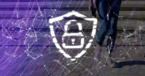 Hovering padlock shield projecting data streams across brick plaza beside Stock Photos