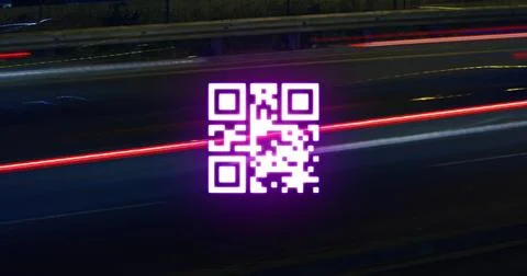 Hovering QR code shining above highway lanes at night, with blurred vehicle 写真素材