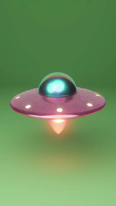 Hovering spaceship emits colorful lights and pulses above green background Stock Footage 313878778