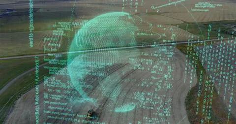 Hovering translucent turquoise digital globe above rural farmland, with 写真素材