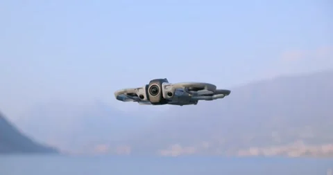 Hovering Travel Drone Over Coastal Water at Daytime Stock Footage 343745642