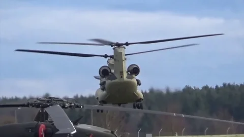 Hovering turn with Chinook helicopter during traffic pattern training Stock Footage 83544451