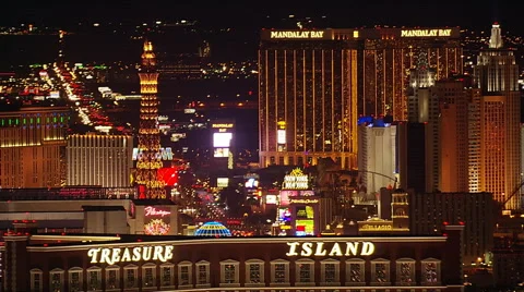 Hovering to view bases of buildings on The Strip in Las Vegas. Shot in 2005. Stock Footage 59514348