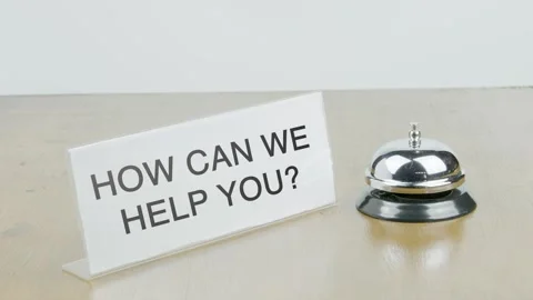 How Can We Help You Office or Room with Hand Ringing The Bell on Desk Stock Footage 300734436