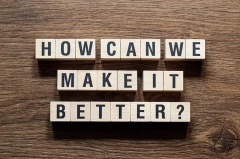 How can we make it better - word concept on building blocks, text Stock Photos
