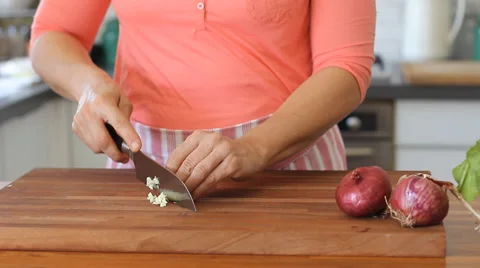 How to chop Garlic bulbs Stock Footage 54780583