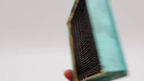 How to clean a HEPA vacuum filter at home Stock Footage 328222725