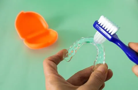 How to clean night guards protect teeth from grinding Stock Photos