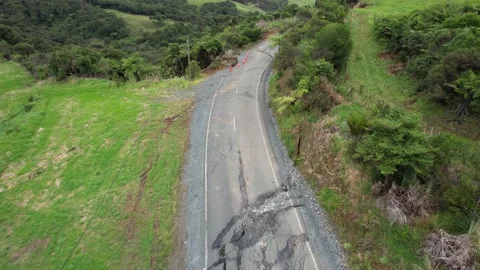 How climate change damages roads in New Zealand Stock Footage 232818613