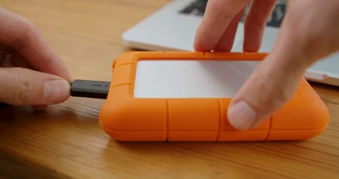 How to Connect External Hard Drive to Laptop Stock-Footage 127676251