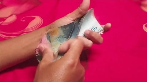 How to count two million Indonesian rupiah Stock Footage 296036946