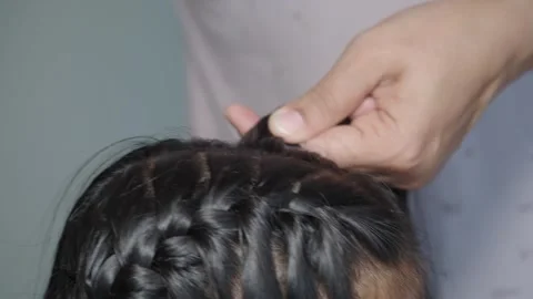 How to create a simple braid hairstyle step by step Stockbeeldmateriaal 328782822