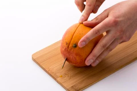 How to cut a mango? Stock Photos