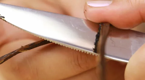 How to Cut Open, Scrape, and Use a Vanilla Bean Stock Footage 68289227