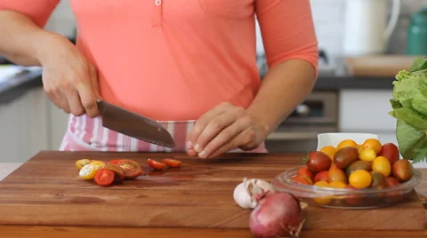 How to cutting cherry tomatoes Stock Footage 54790599