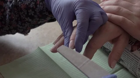 How to do nail. Counting nails Professional LED Uv Gel Nail Polish in the salon Stock Footage 74108814