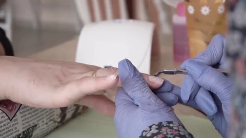 How to do nail. Counting nails Professional LED Uv Gel Nail Polish in the salon Stock Footage 74109430