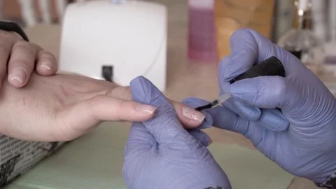 How to do nail. Counting nails Professional LED Uv Gel Nail Polish in the salon Stock Footage 74109730