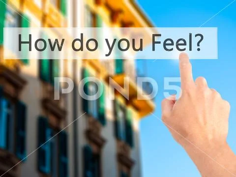 How do you Feel - Hand pressing a button on blurred background c Stock Photos