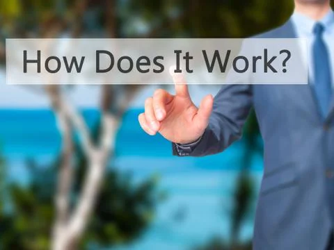 How Does It Work - Businessman hand pressing button on touch screen interface Stockfoto's