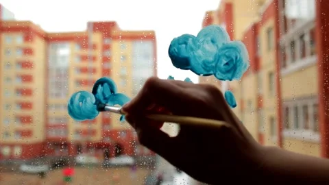 How to draw a cloud with paint and brush on a window. Step 2 Stock Footage 130825420