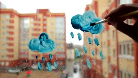 How to draw a cloud with paint and brush on a window. Step 3. Stock Footage 130825446