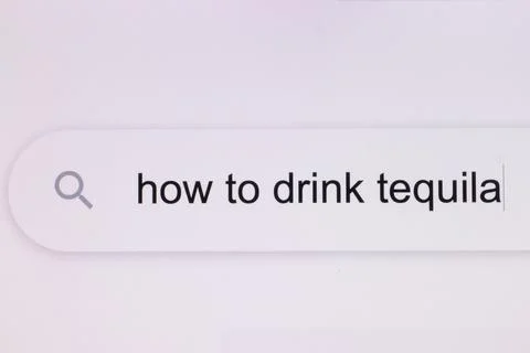 How to drink tequila - pc screen internet browser search engine bar typing Stock Photos