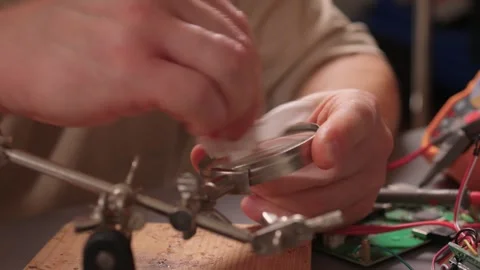 How to Effectively Clean a Magnifying Glass for Precise Precision Tasks and Work Stock Footage 316949728