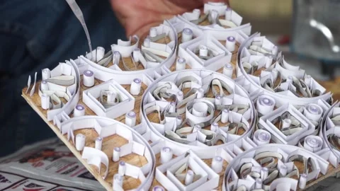 How to glue the batik pattern from paper Stock Footage 141568740