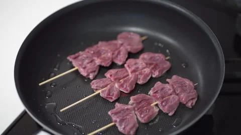 How to grill chicken hearts Stock Footage 277624705