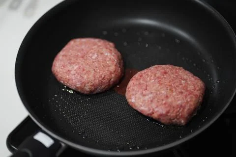 How to grill a hamburger Stock Photos