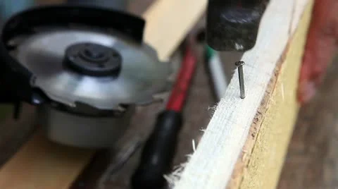 How to hammer a nail Stock Footage 11447128