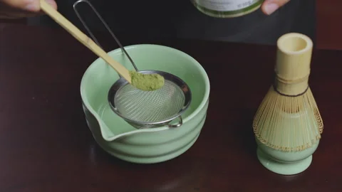 How to home made matcha tea mix with soy milk. Making Japanese matcha tea. .. Stock Footage 322512289