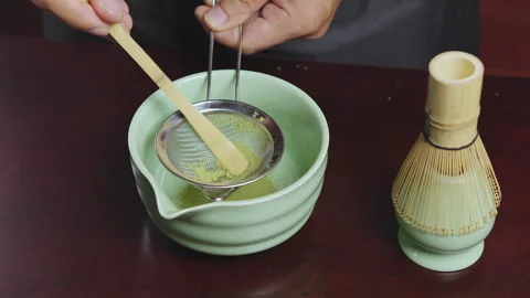 How to home made matcha tea mix with soy milk. Making Japanese matcha tea. .. Stock Footage 322512814