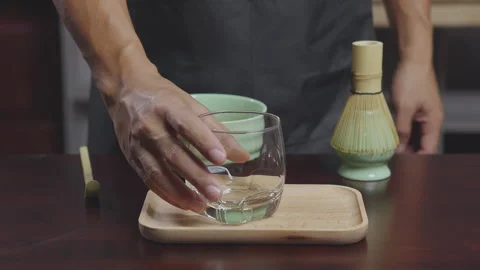 How to home made matcha tea mix with soy milk. Making Japanese matcha tea. .. Stock Footage 322513392