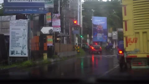 How it feels in the car when it stops at a traffic light and it s raining Video stock 219594805