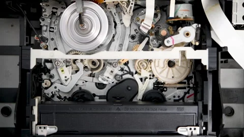 How the loading mechanism works in a VHS video recorder Stock Footage 305257161