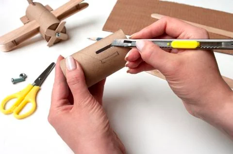 How to make airplane. Hand made toy,zero waste from toilet paper roll and pop Stock Photos