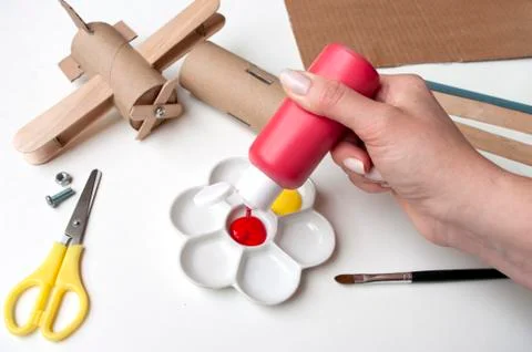 How to make airplane. Hand made toy,zero waste from toilet paper roll and pop Stock Photos