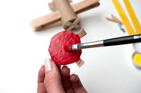 How to make airplane. Hand made toy,zero waste from toilet paper roll and pop Stock Photos