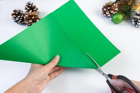 How to make a creative Christmas tree from colored paper Stock Photos