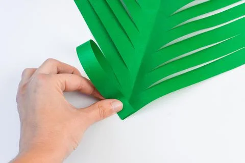 How to make a creative Christmas tree from colored paper and glue Stock Photos